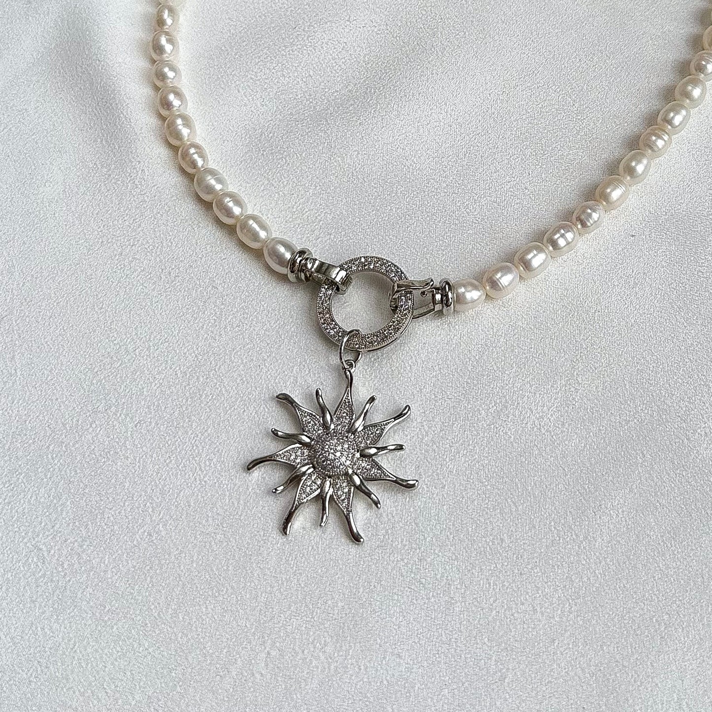 Necklace with sunshine pendant (rhodium plated)