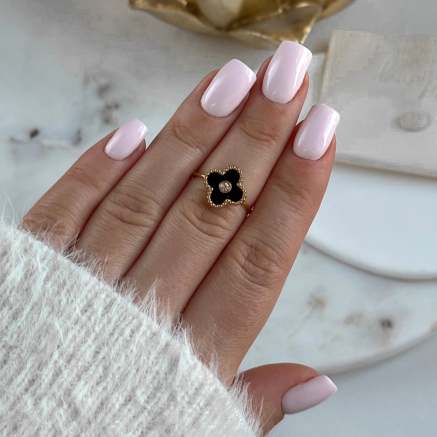 Black onyx and crystal clover ring