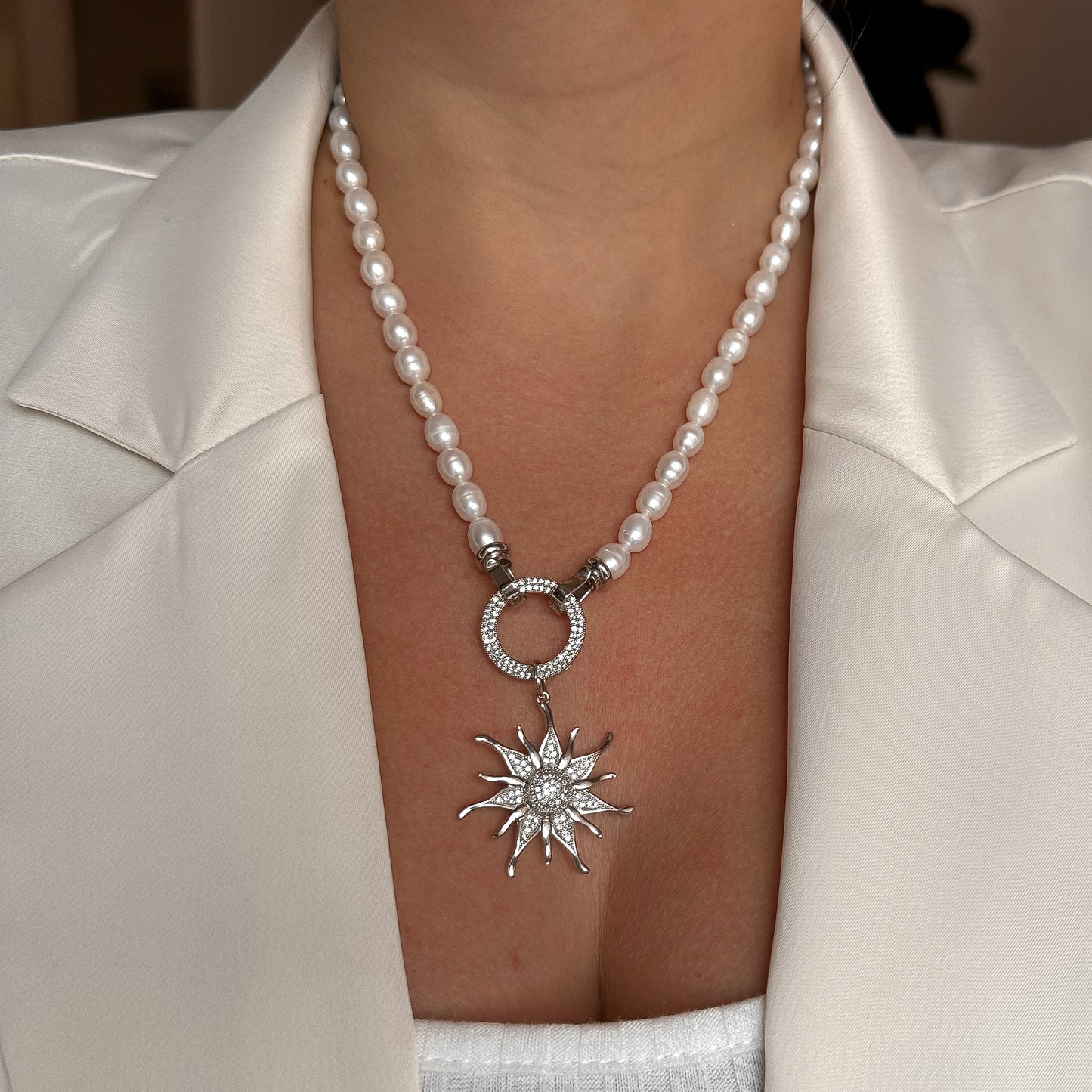 Necklace with sunshine pendant (rhodium plated)