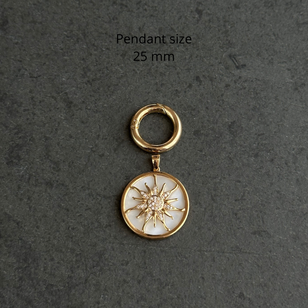 Necklace charm (sun on mother-of-pearl base)