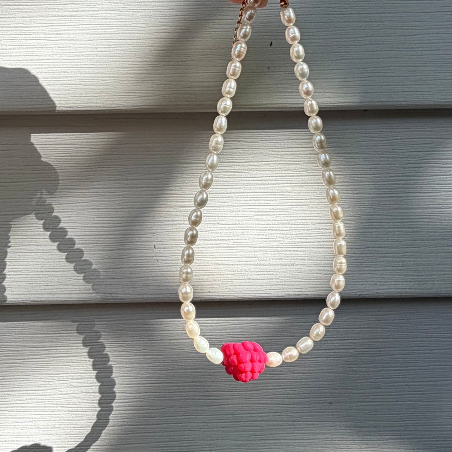 Viral raspberry’s pearl necklace