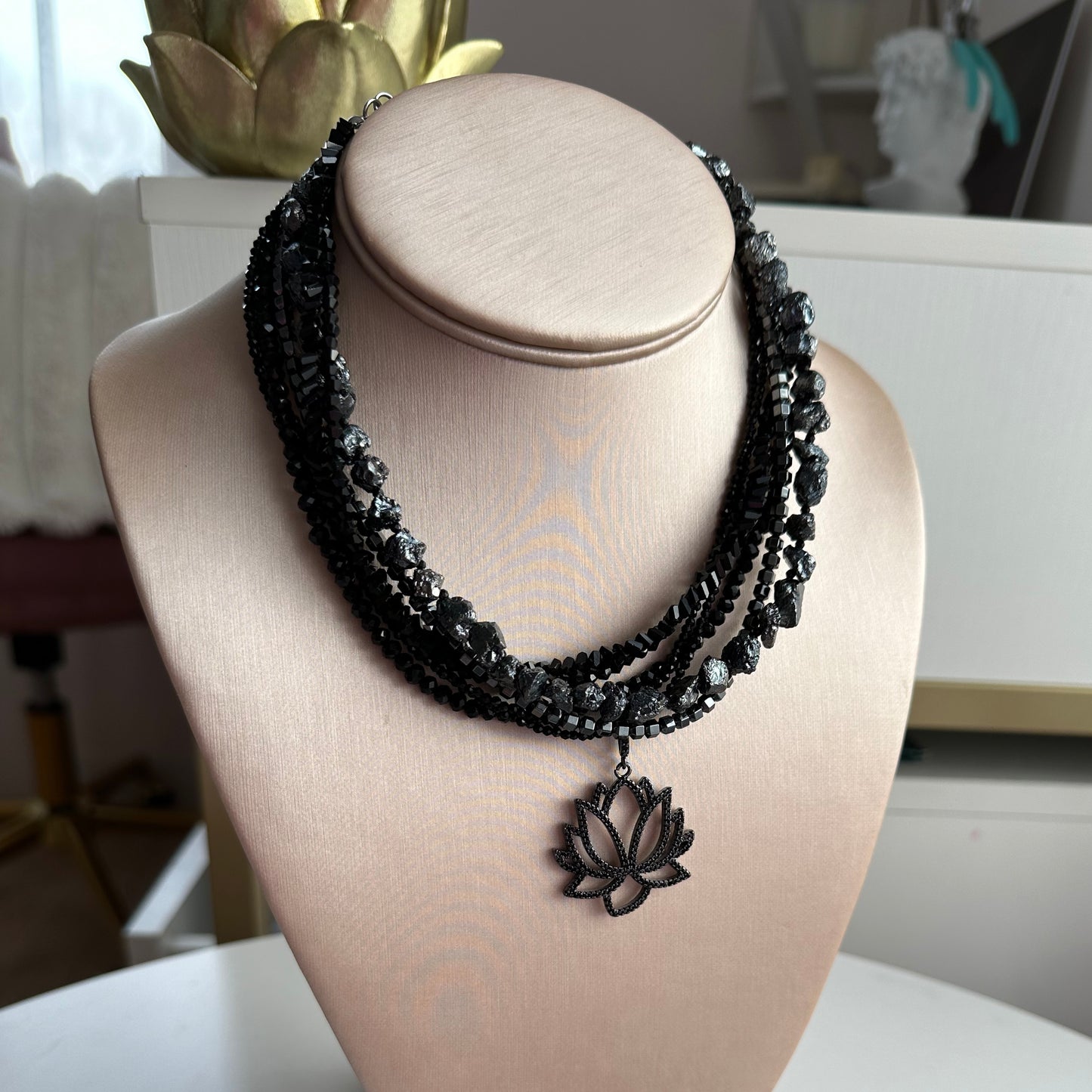 Black lotus necklace