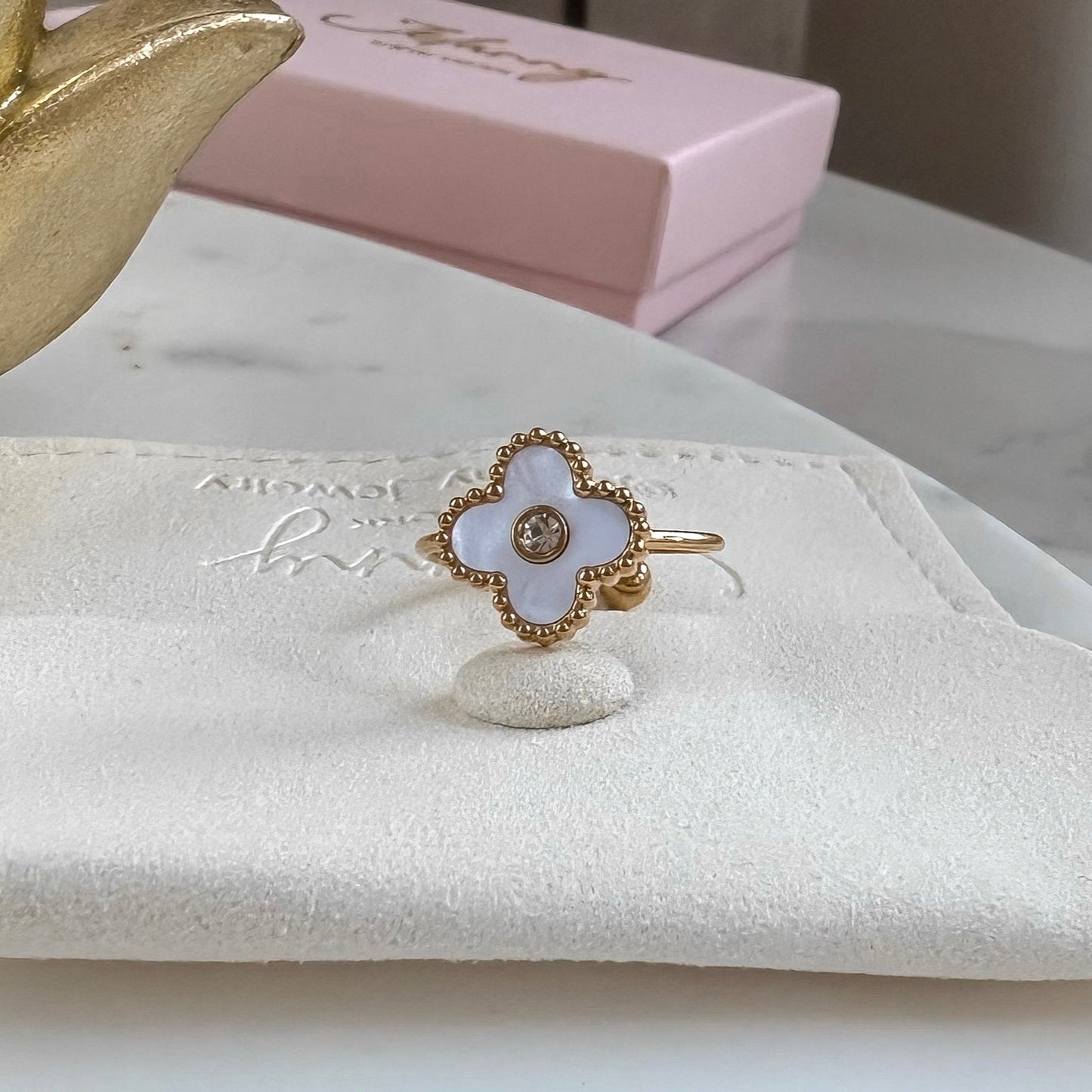 Mother-of-pearl and crystal clover ring