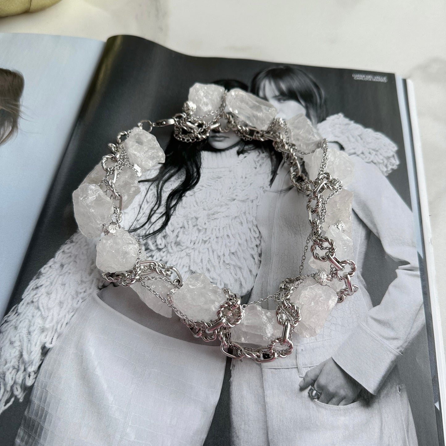 Unusual necklace with raw crystal quartz and chains (grey)