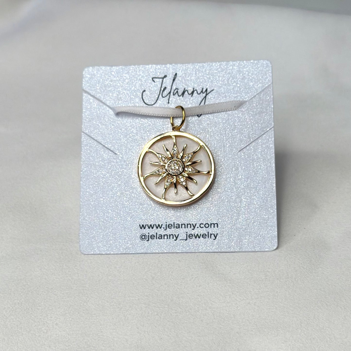 Sun on mother-of-pearl base charm 1 pc