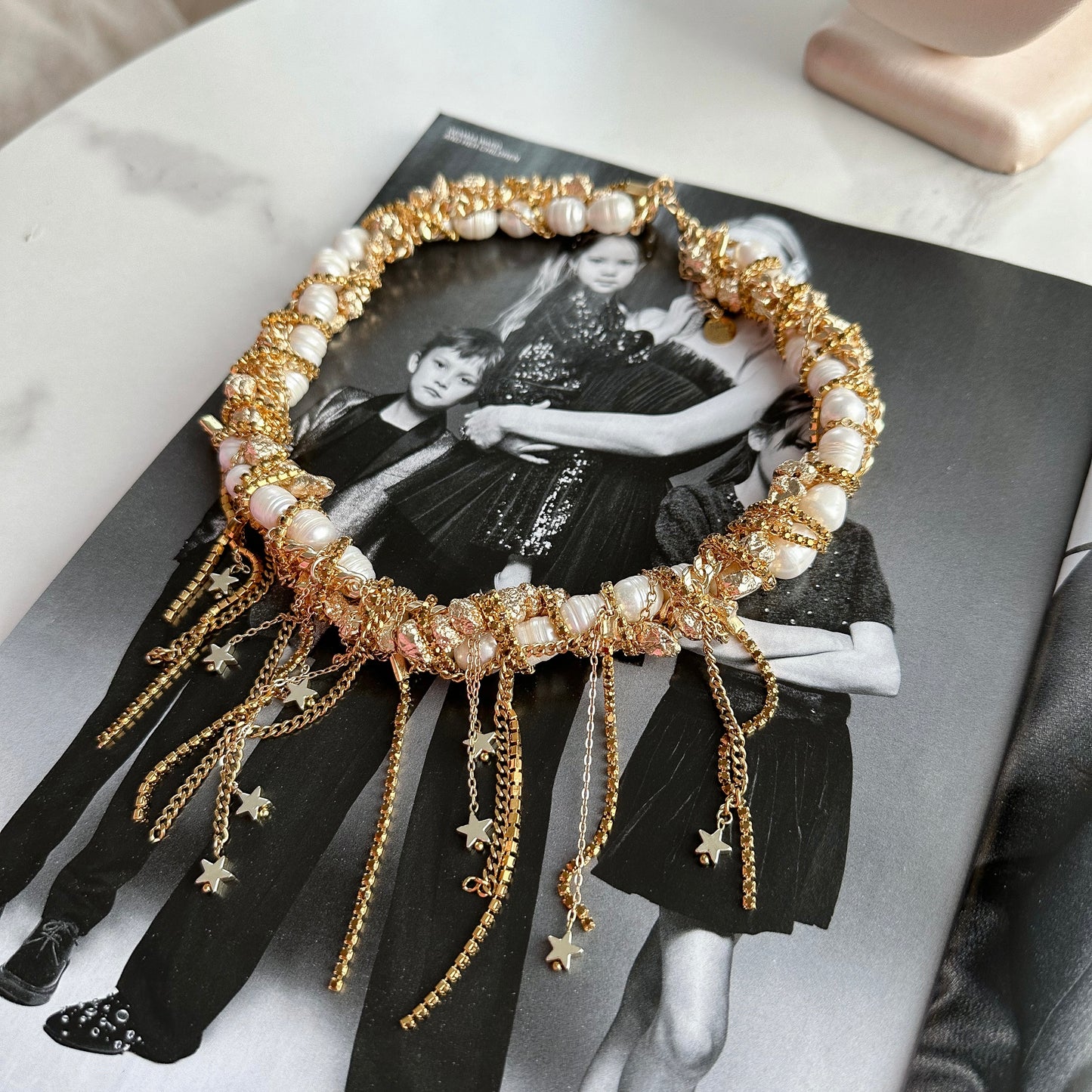Unusual necklace with natural pearls ,crystals and chains (gold)