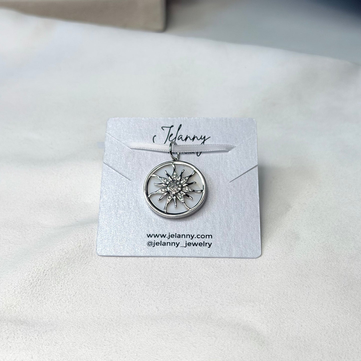 Sun on mother-of-pearl base charm 1 pc