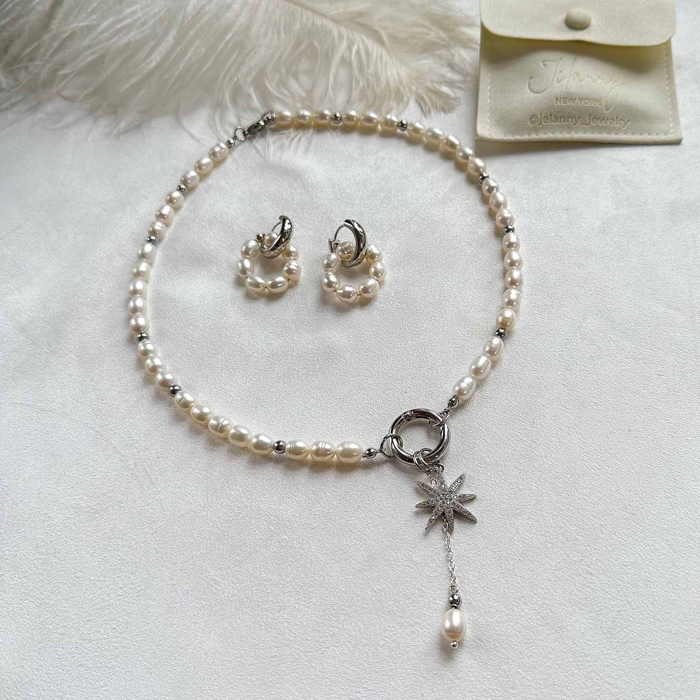 Necklace with star and pearl pendants (rhodium plated)