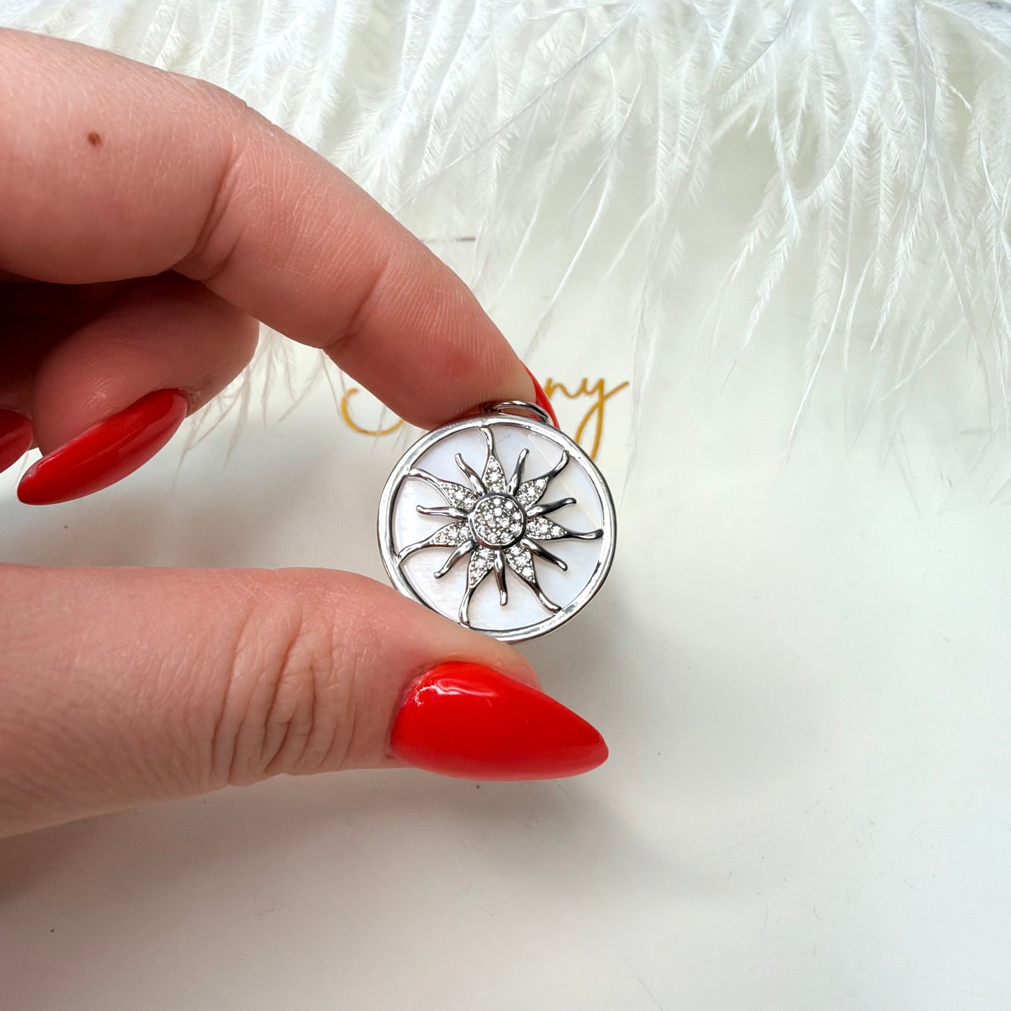 Sun on mother-of-pearl base charm 1 pc