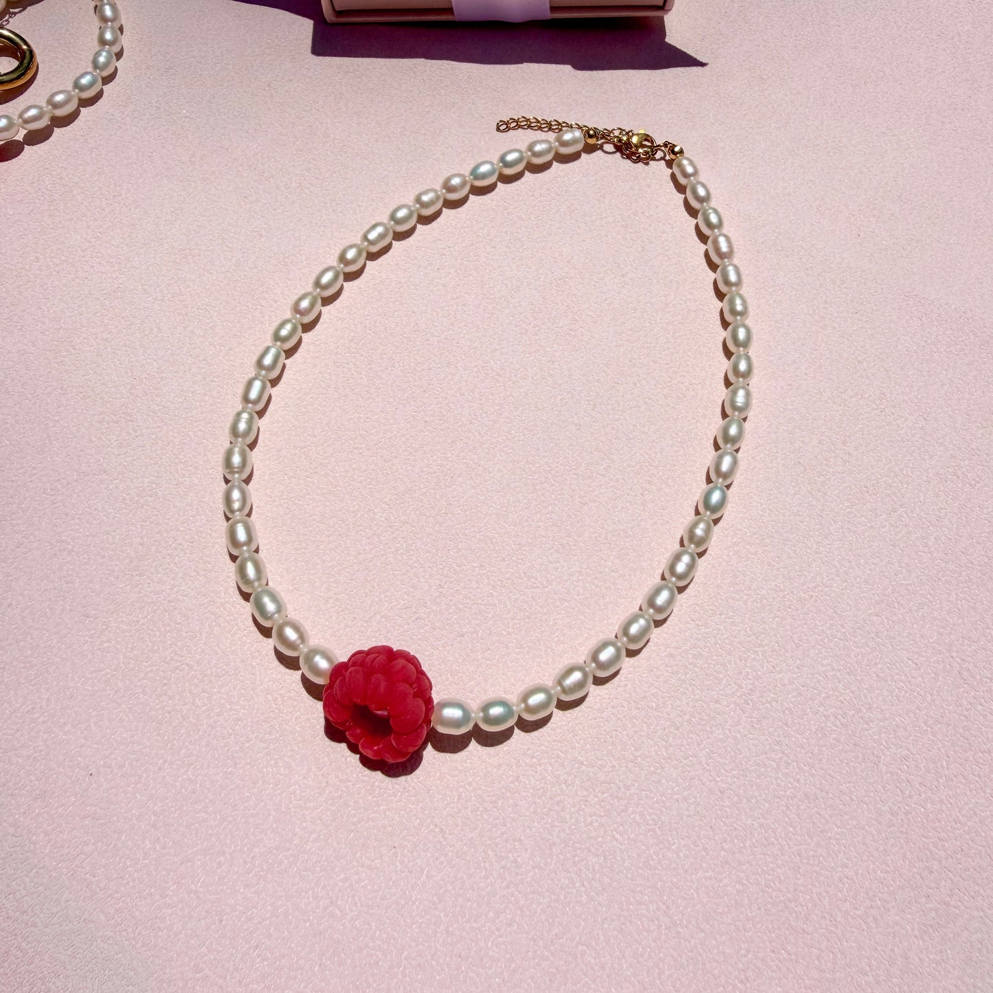 Viral raspberry’s pearl necklace