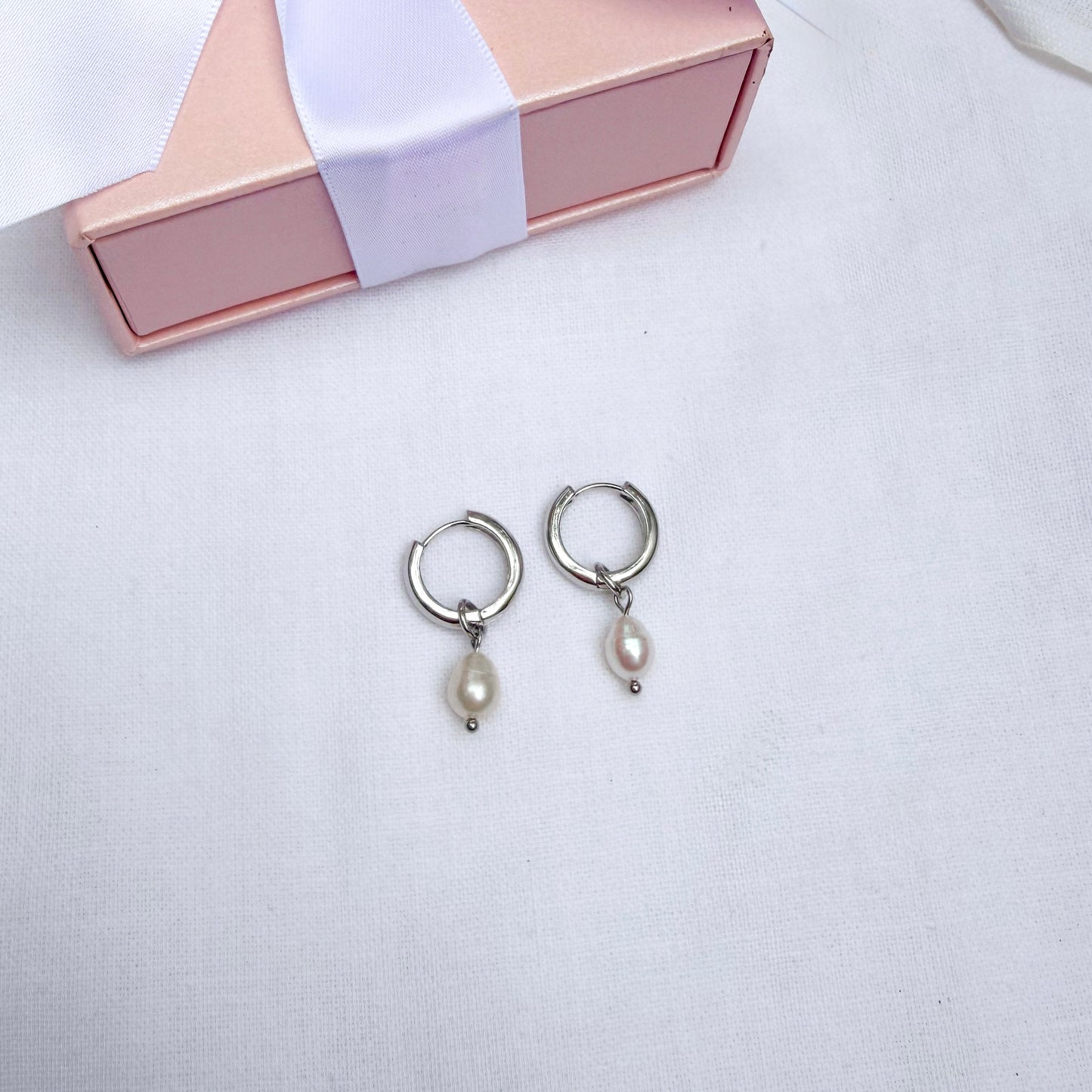 Minimalist pearl hoop earrings with interchangeable pendants