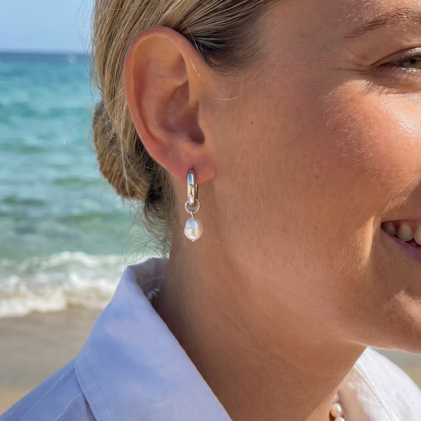Minimalist pearl hoop earrings with interchangeable pendants