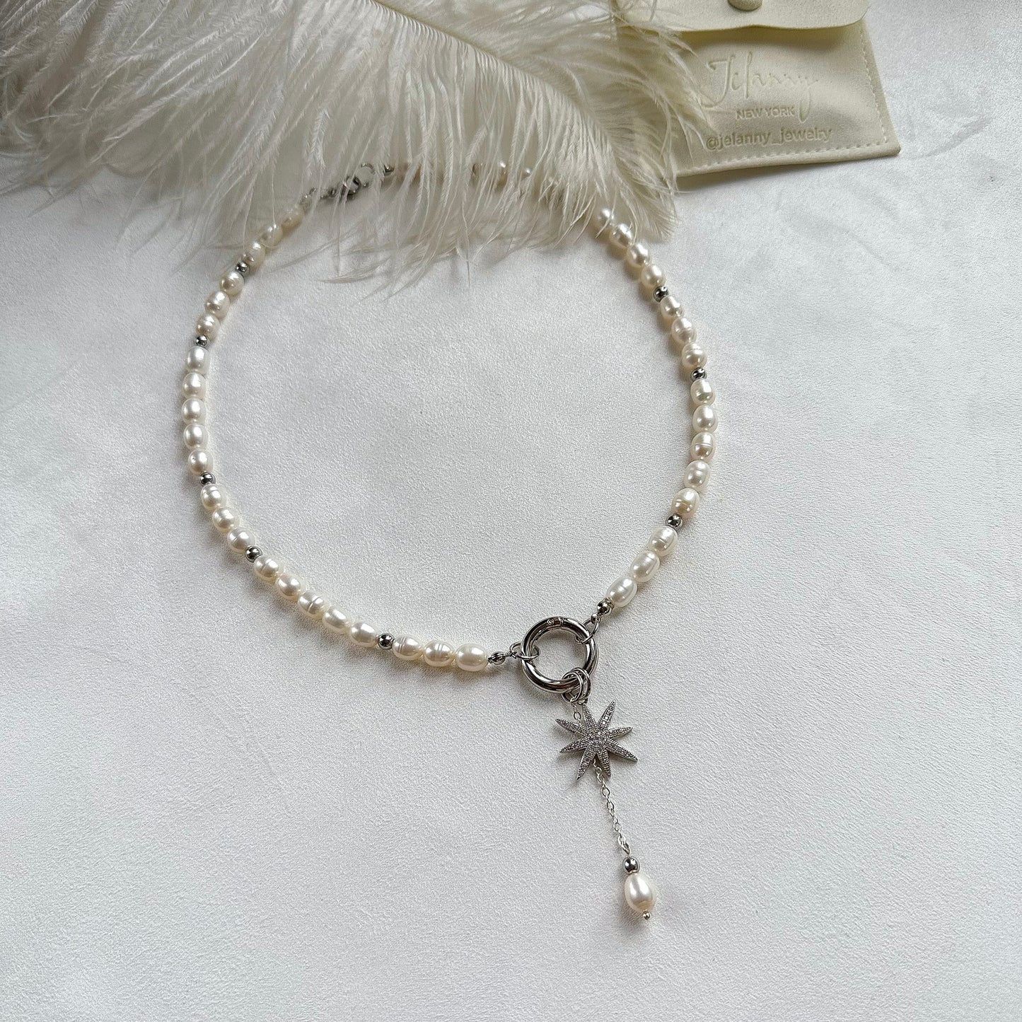 Necklace with star and pearl pendants (rhodium plated)