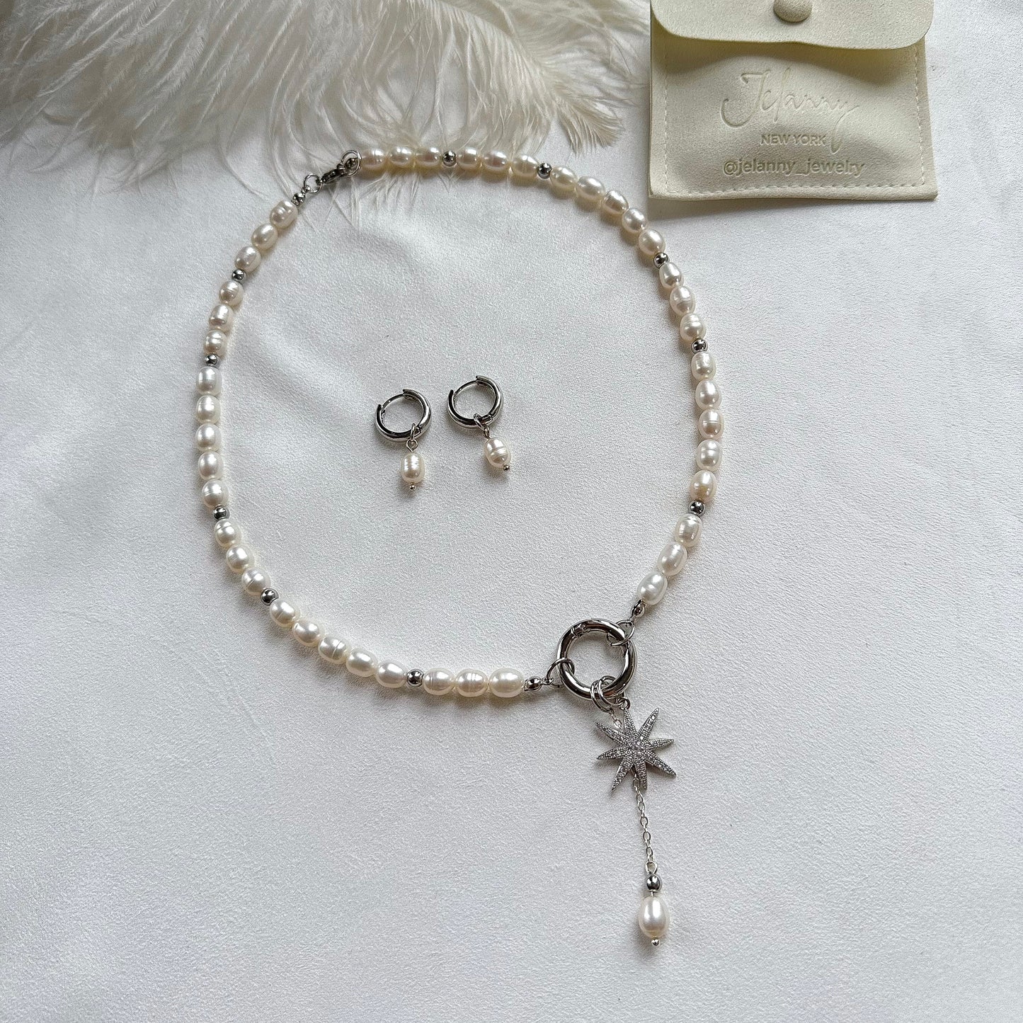 Necklace with star and pearl pendants (rhodium plated)