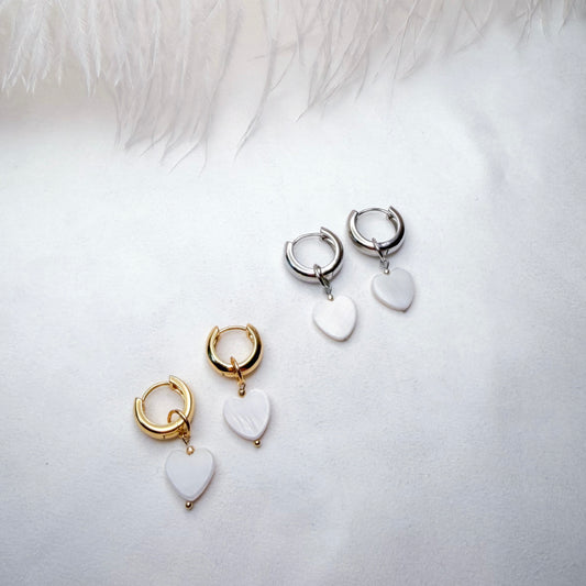 Hoop earrings with interchangeable heart pendants