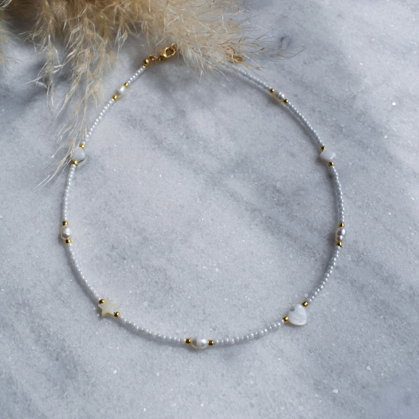 White choker with pearls and shell beads
