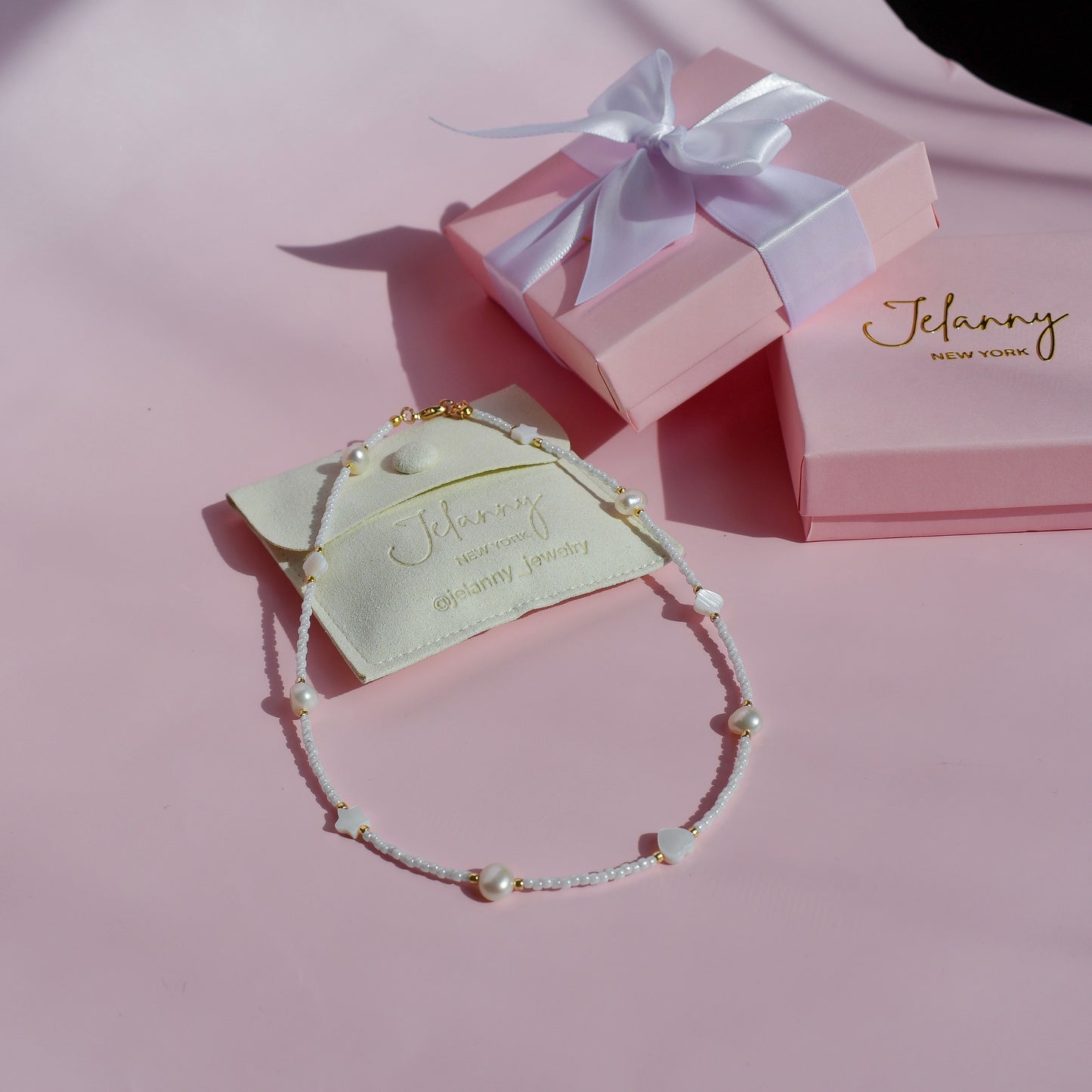 White choker with pearls and shell beads