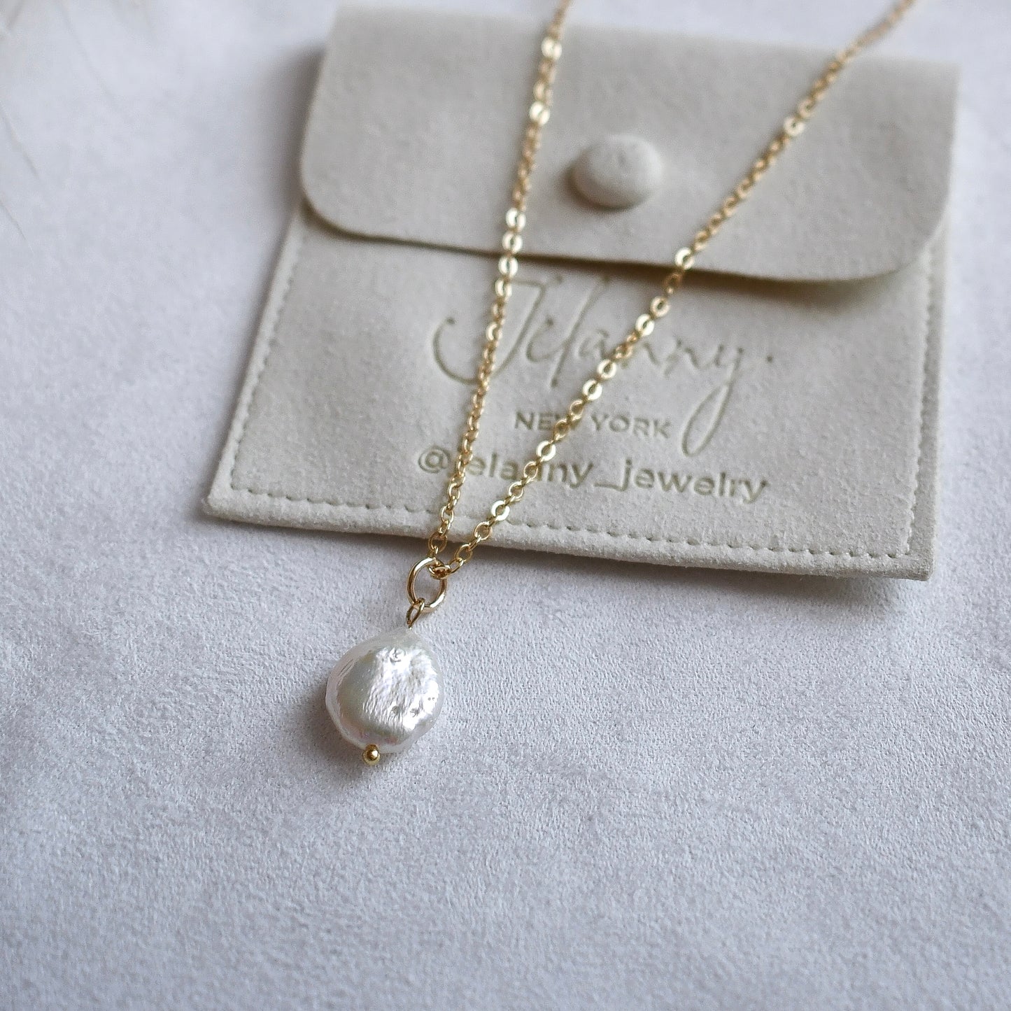 Chain necklace with baroque coin pearl pendant