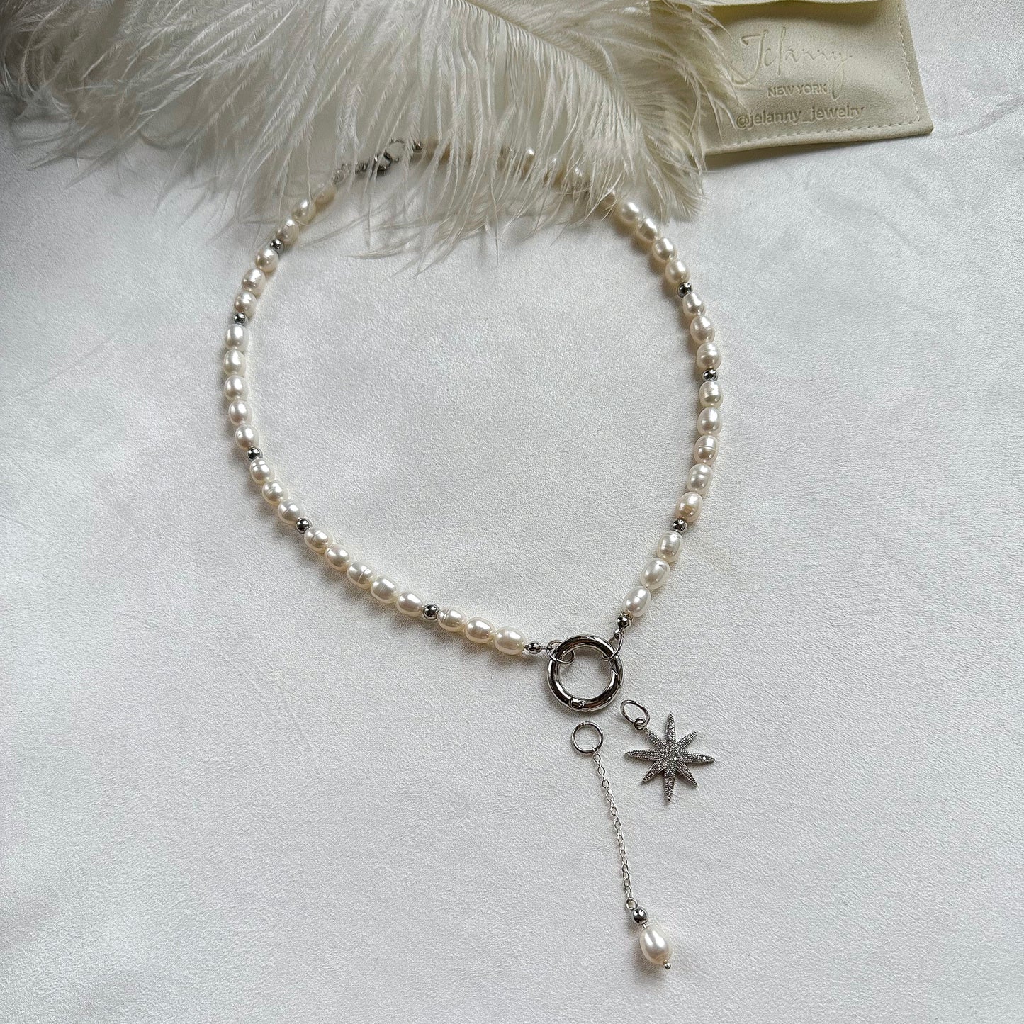 Necklace with star and pearl pendants (rhodium plated)