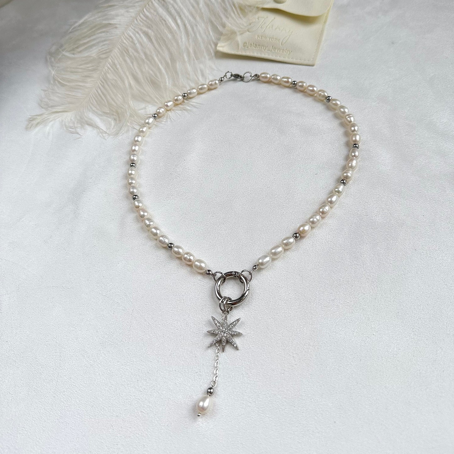 Necklace with star and pearl pendants (rhodium plated)