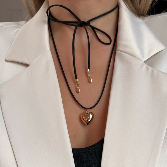 Suede choker with heart pendant