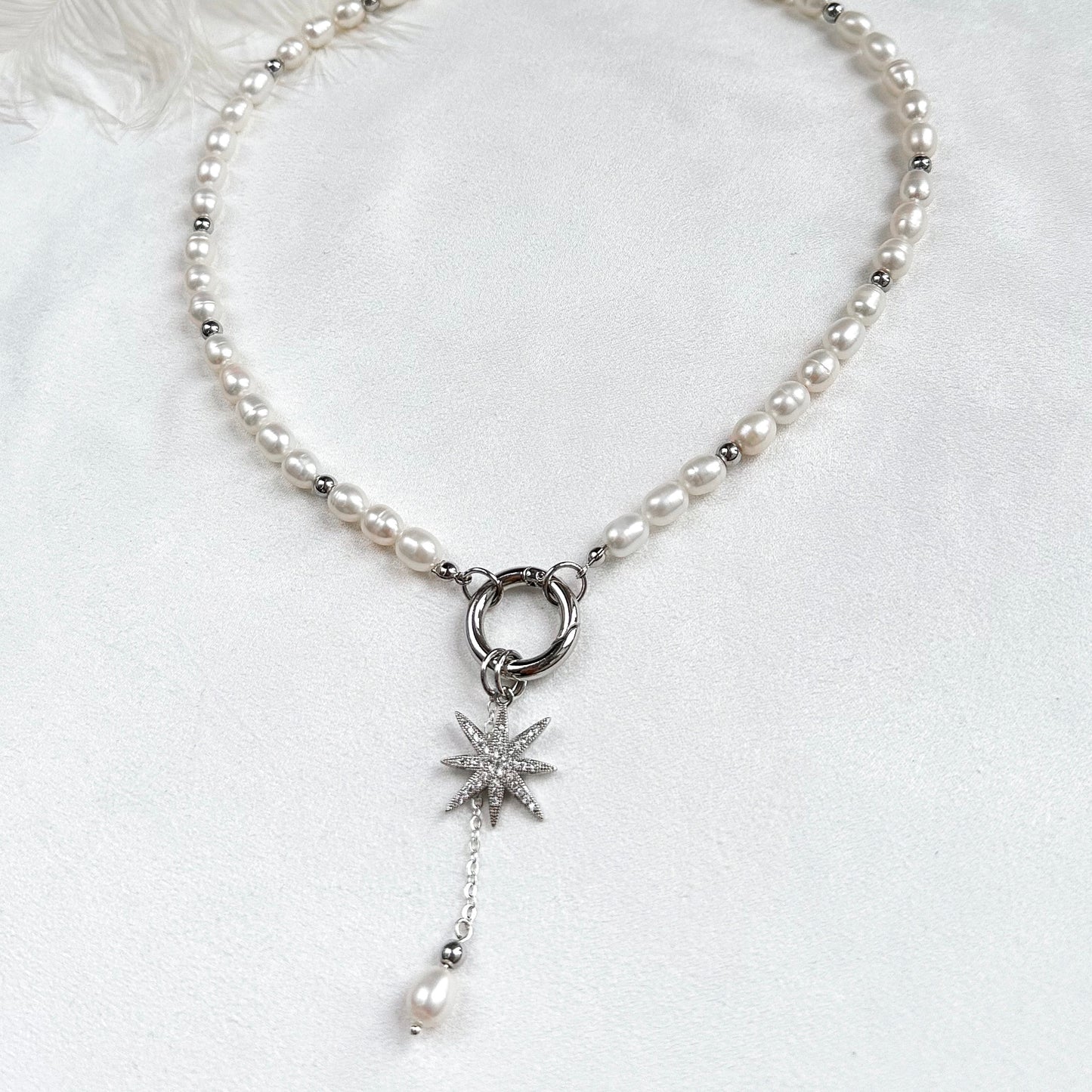 Necklace with star and pearl interchangeable pendants