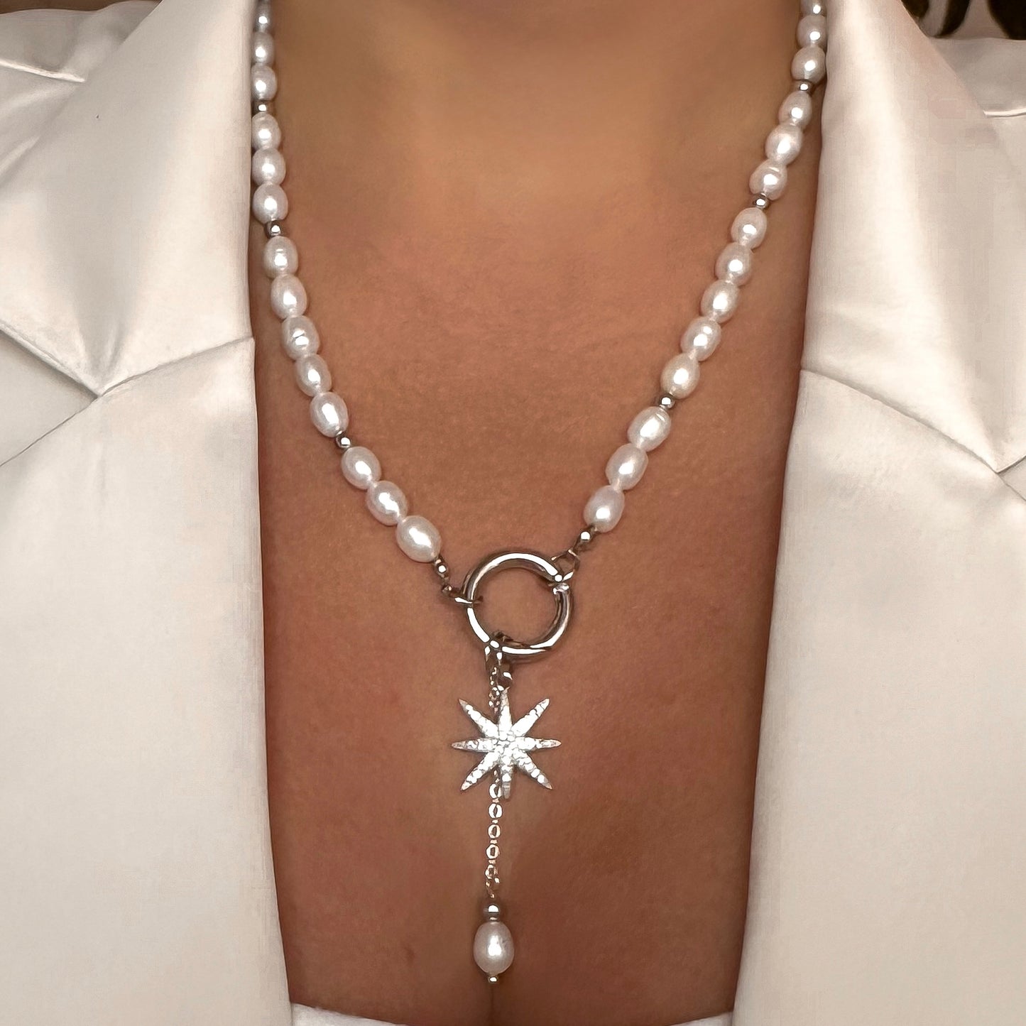 Necklace with star and pearl interchangeable pendants