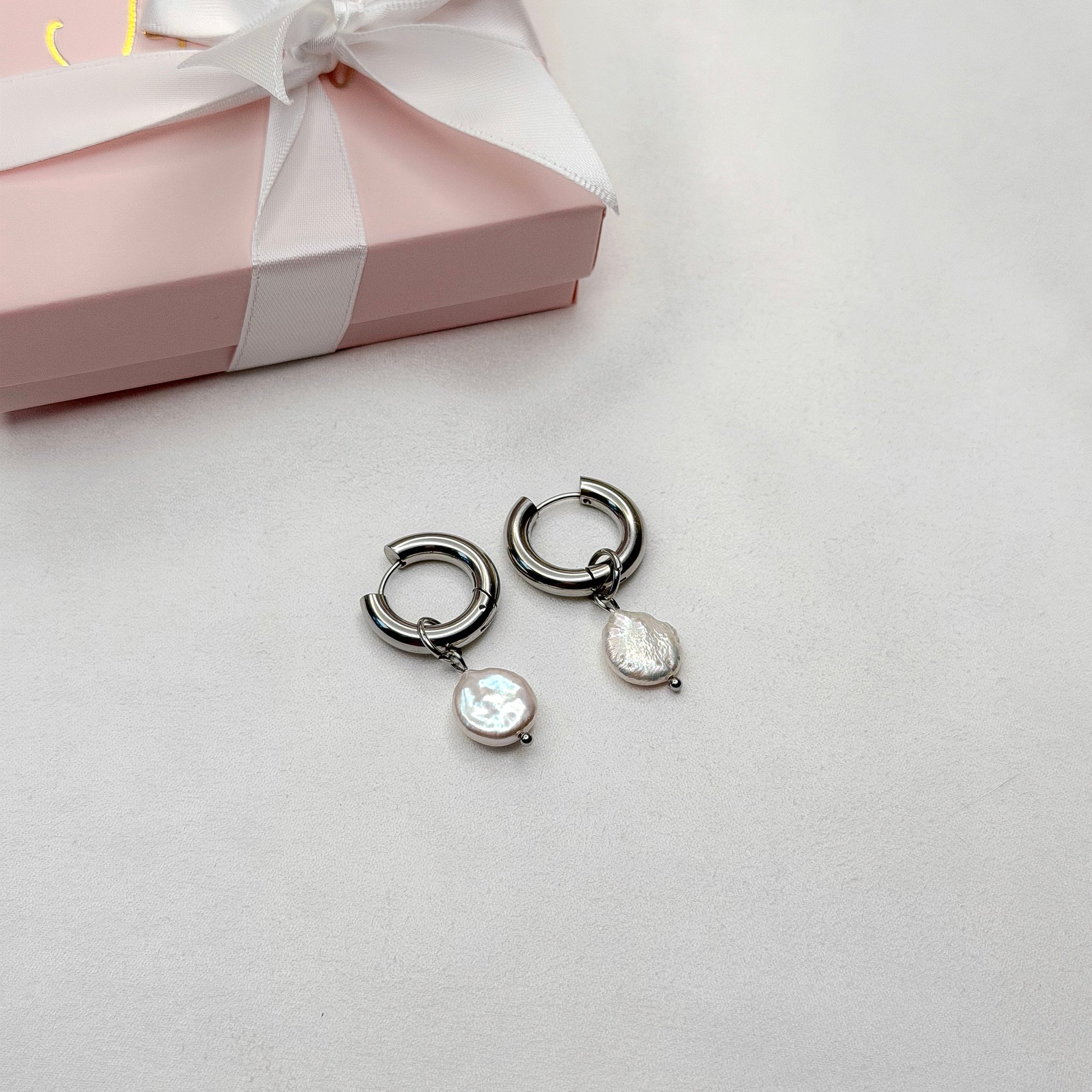 Pearl hoop earrings with interchangeable charms elegant handmade pearl jewelry for everyday wear