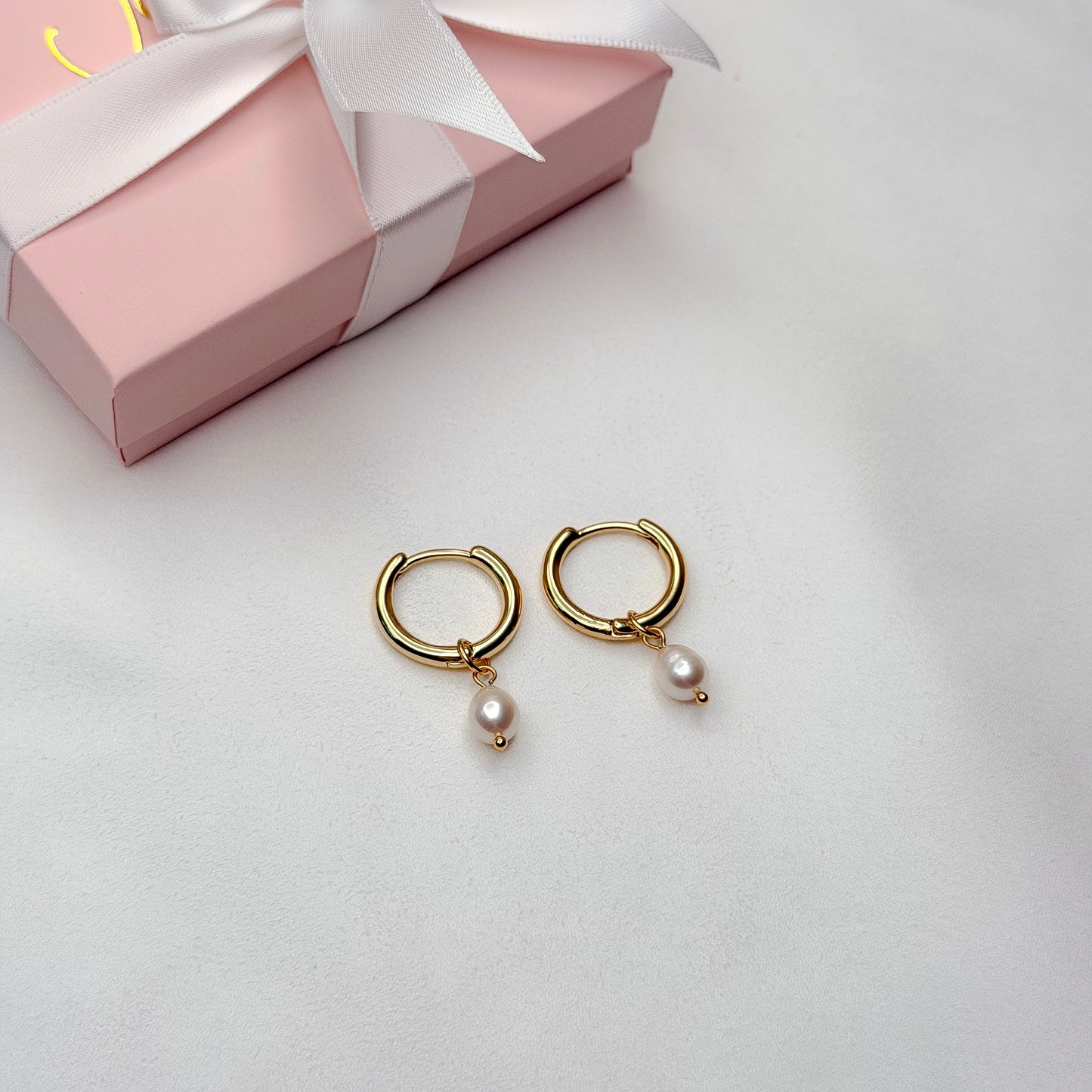 pearl drop earrings worn look minimalist pearl jewelry for everyday and events