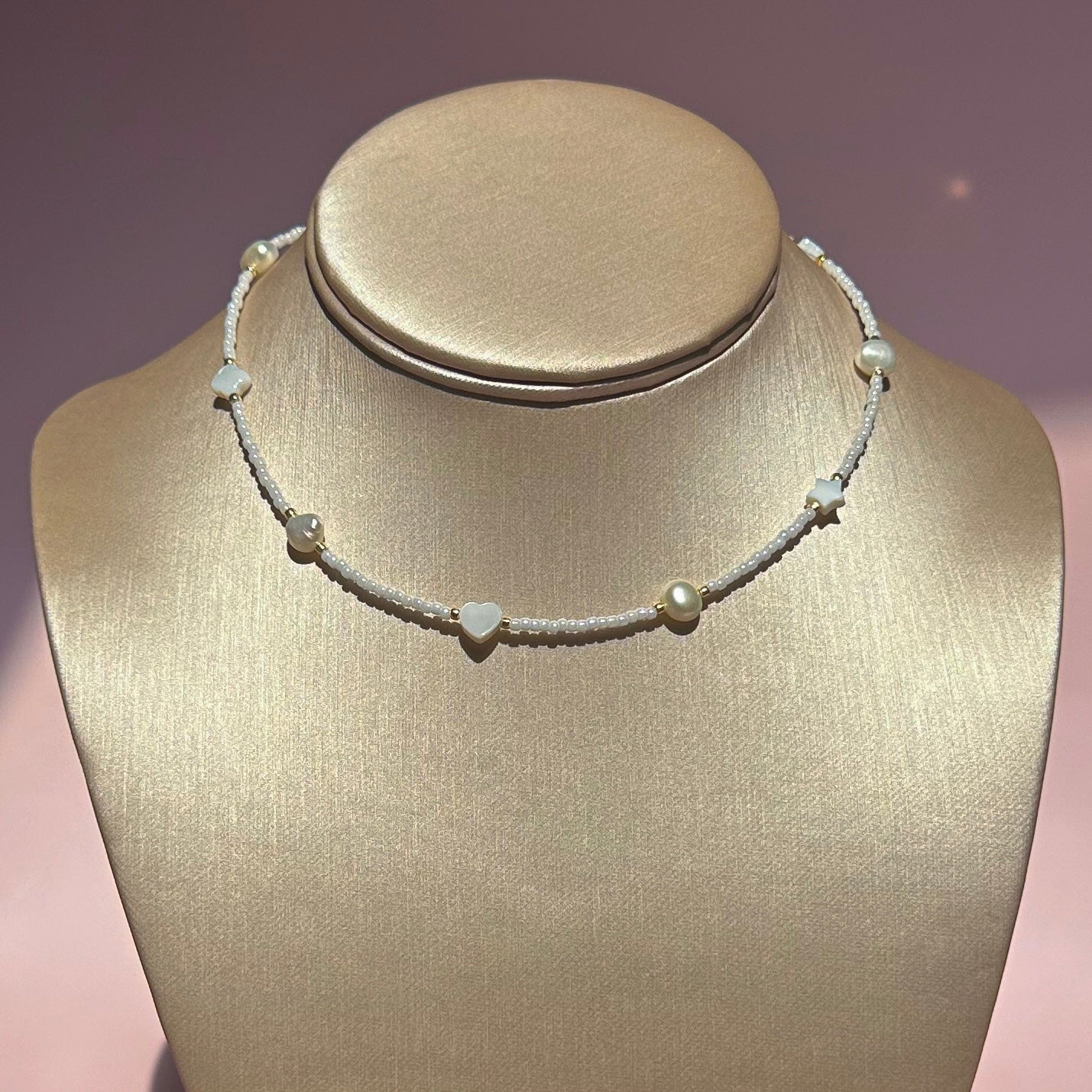 White choker with pearls and shell beads