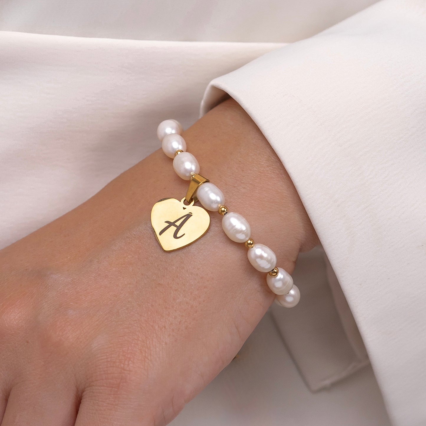 Personalized pearl bracelet styled on wrist