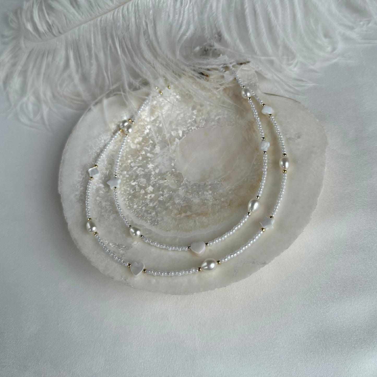 White choker with pearls and shell beads