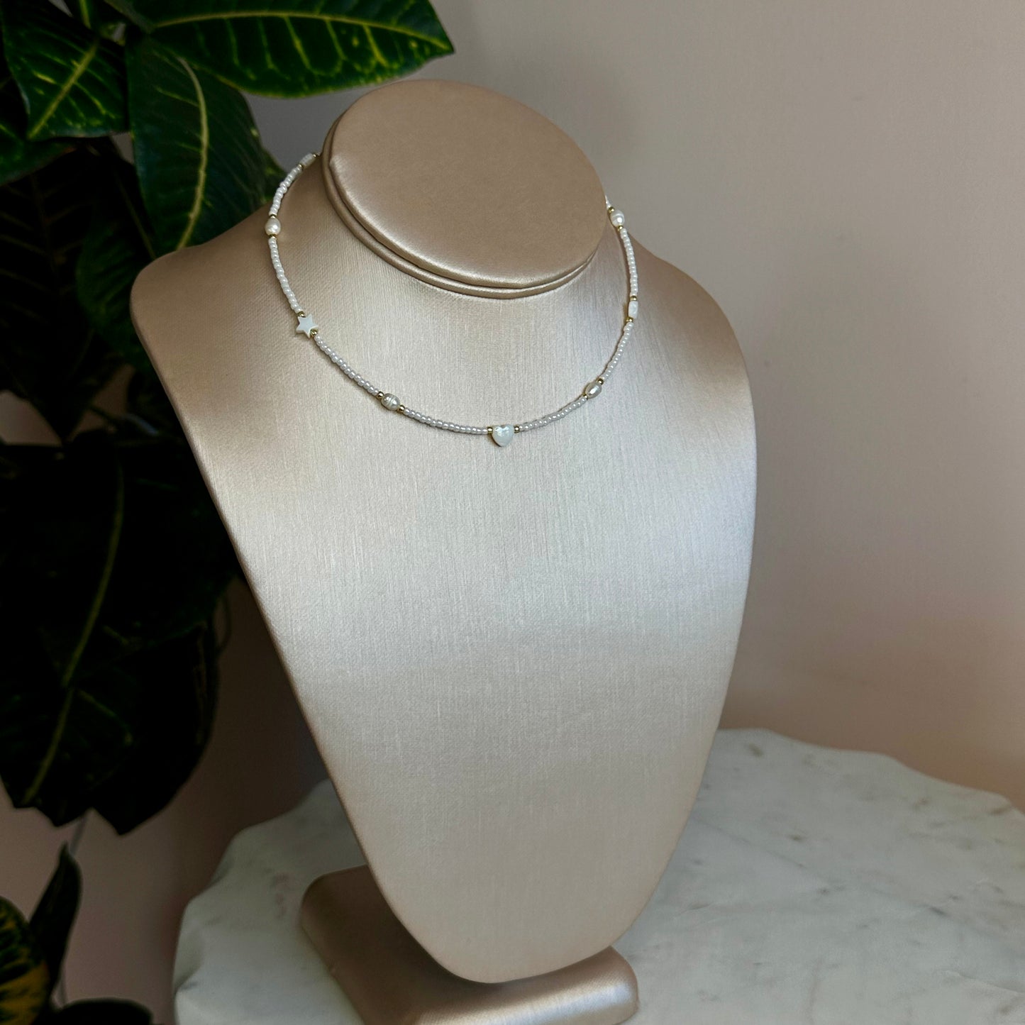 White choker with pearls and shell beads