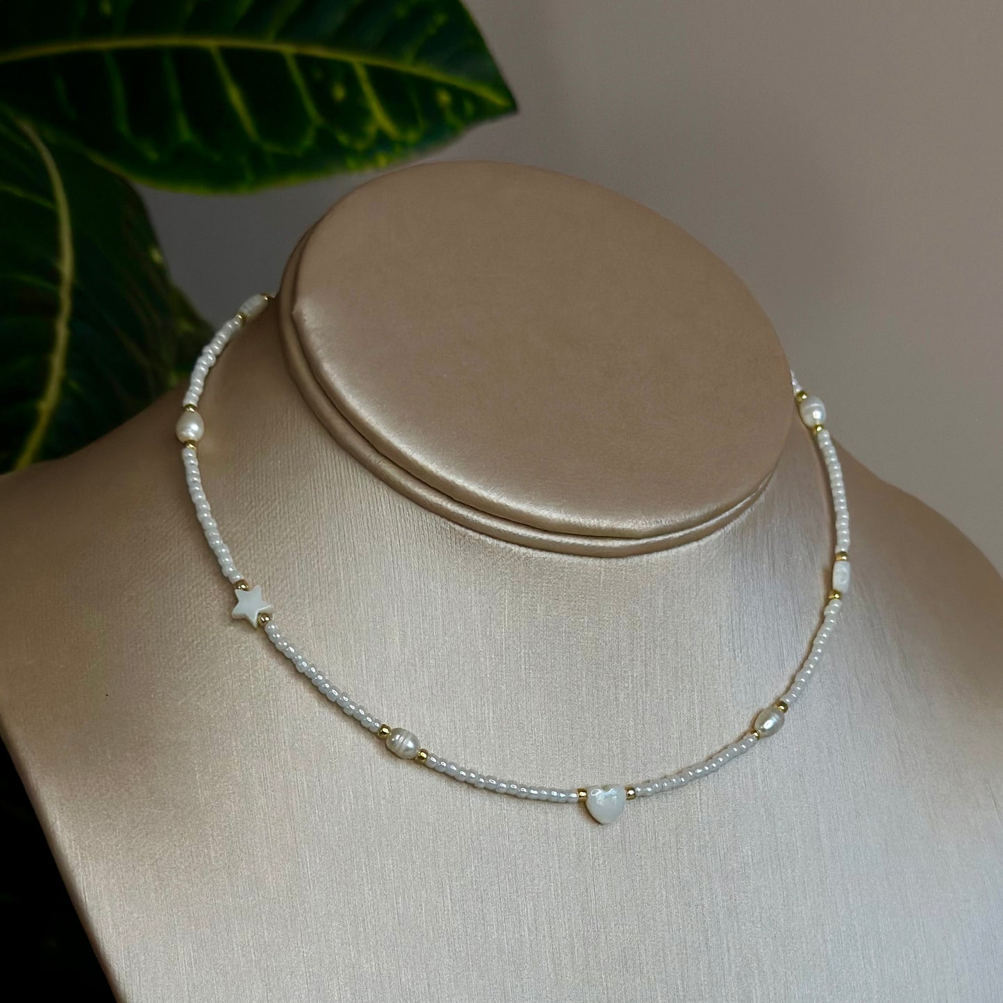 White choker with pearls and shell beads