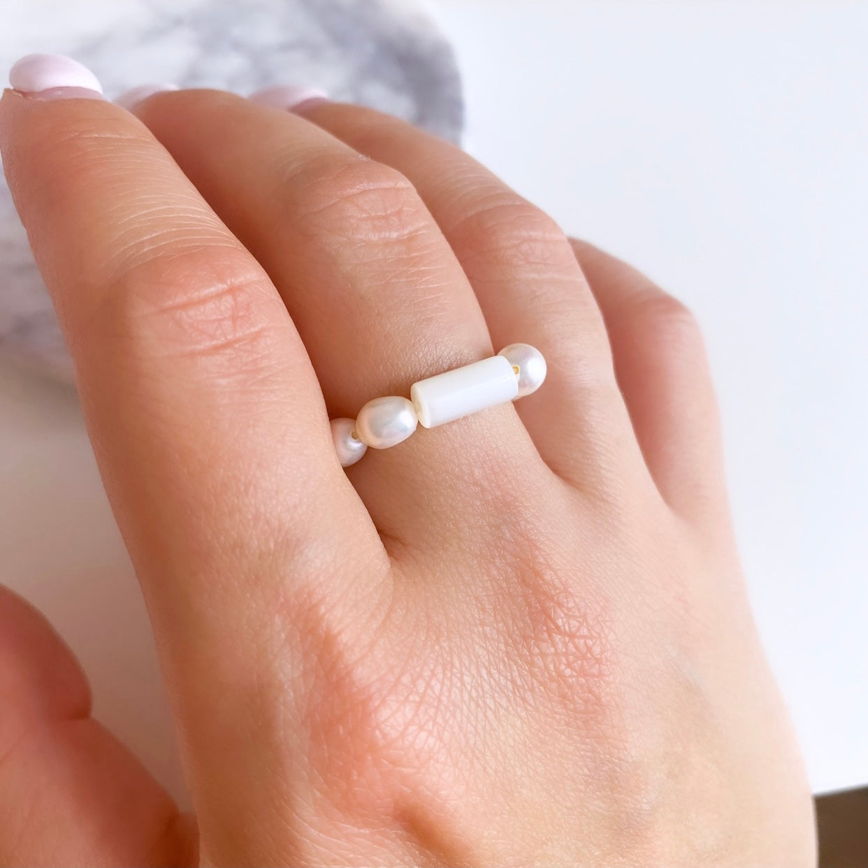 Pearl ring with mother of pearl bead