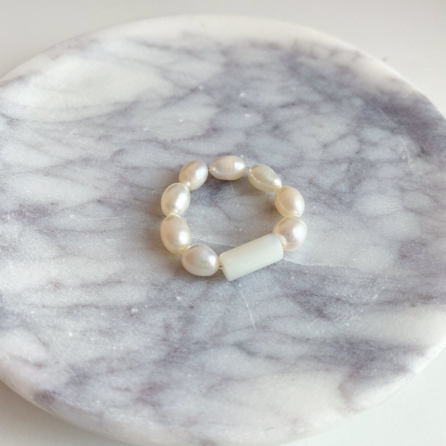 Pearl ring with mother of pearl bead